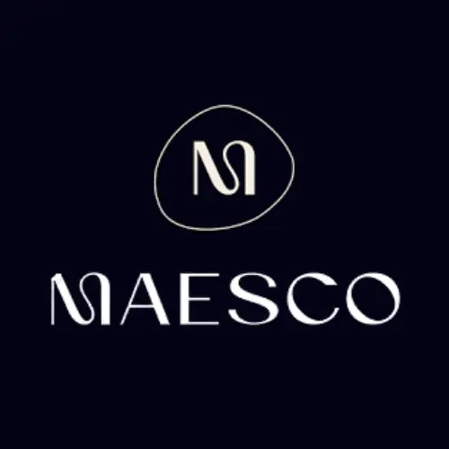 MAESCO logo a circular emblem with an abstract M above the word MAESCO on a dark background